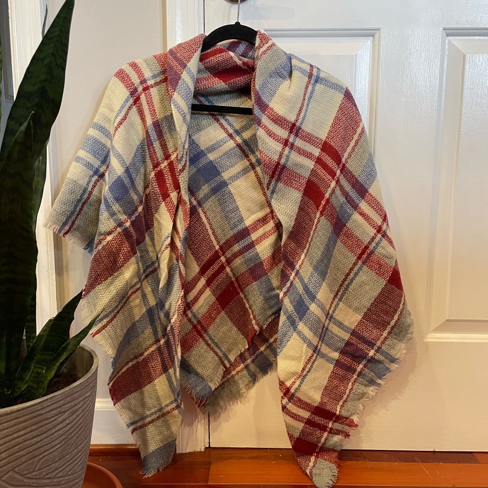 Plaid blanket scarf with slightly frayed edges